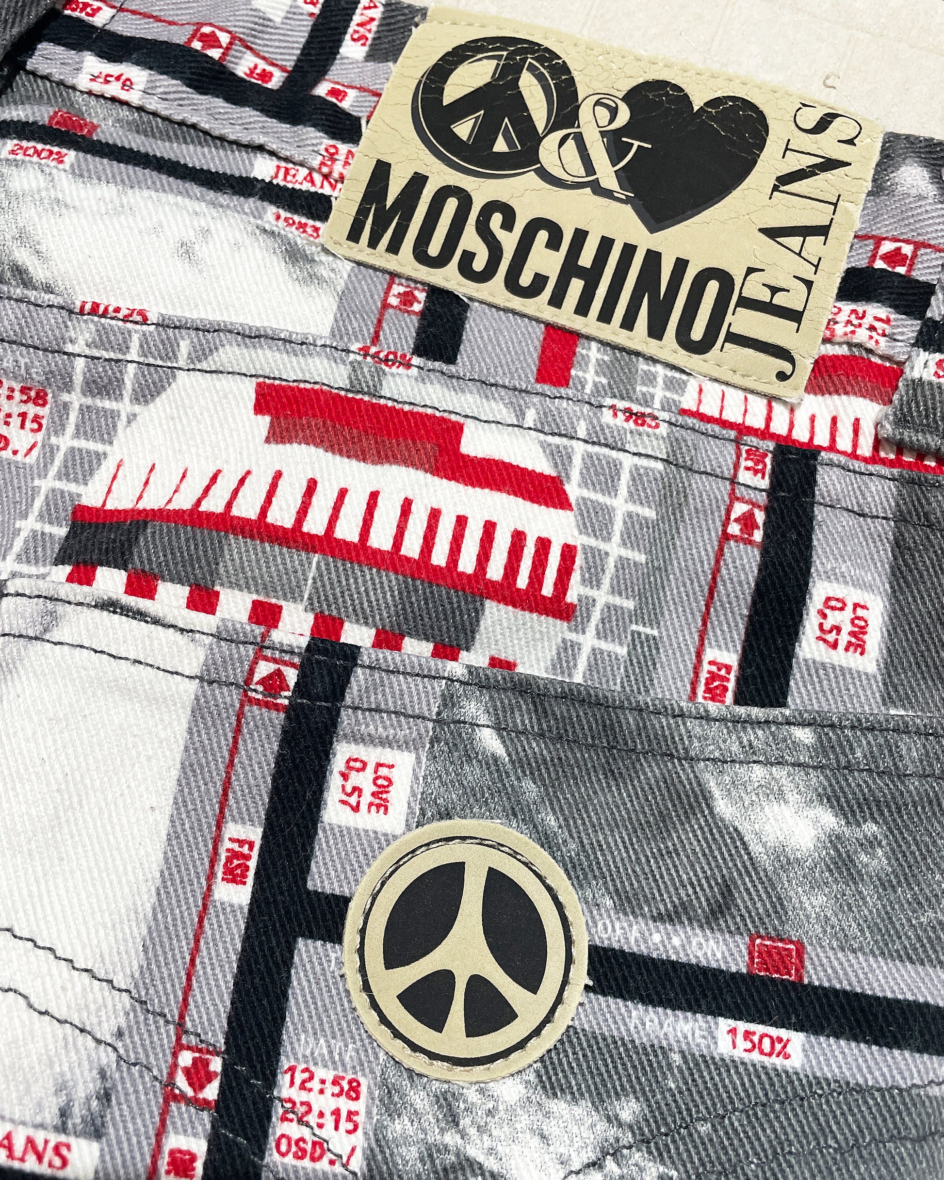 Moschino Jeans Couture vintage button-fly high-waist jeans with CND logo patch